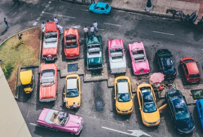 overhead-shot-assorted-cars-different-colors-parking-lot